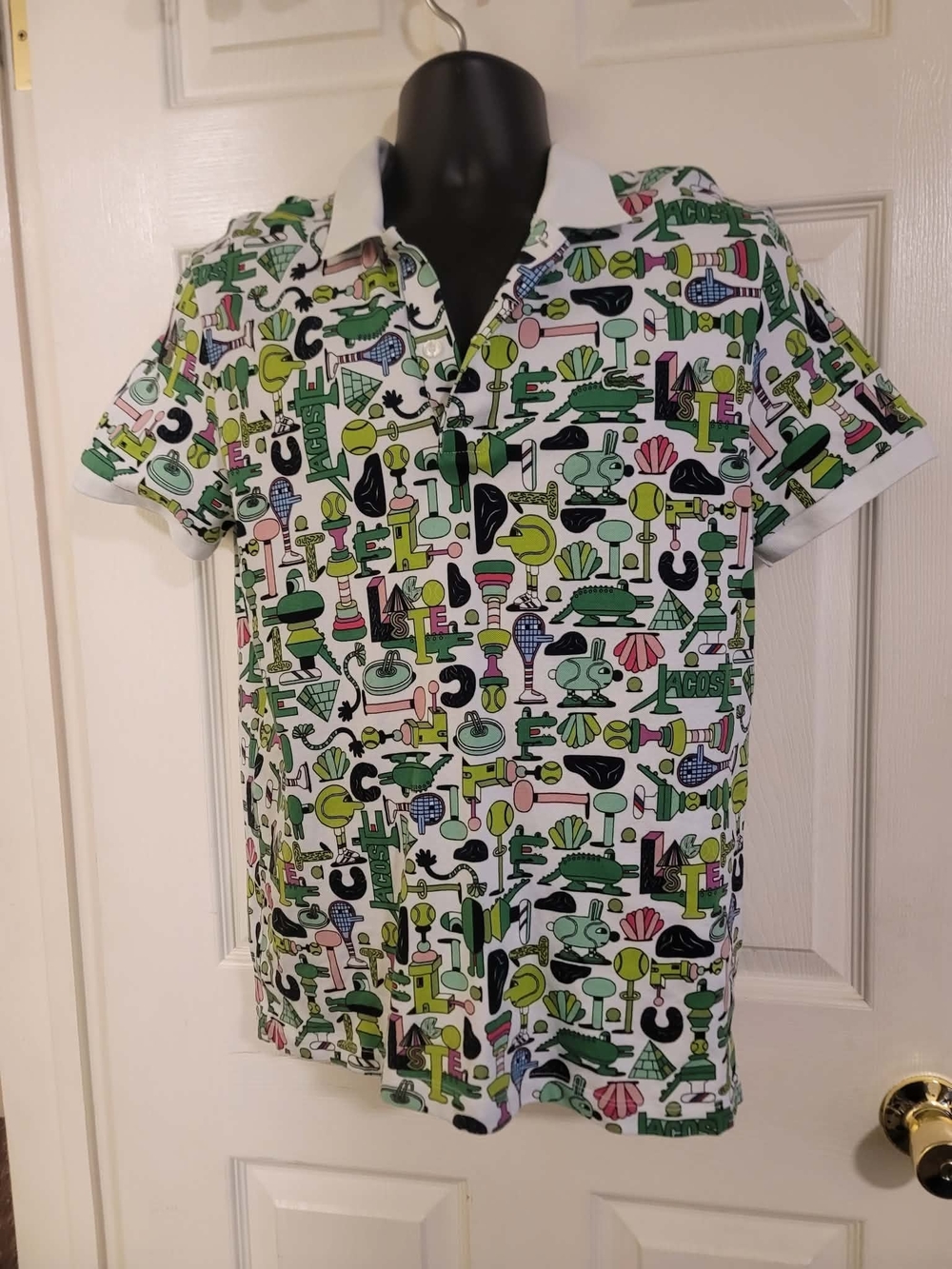 Lacoste White Polo with Green, Black and Pink Graphic Icons